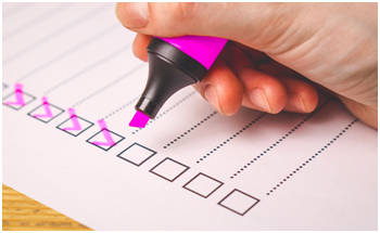 man writing document